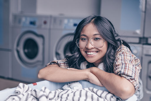 smiling girl with a basket P6TMUA4